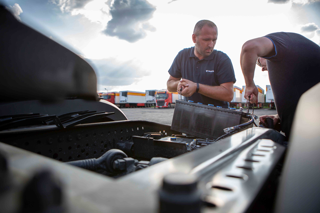 Mechanics replacing battery