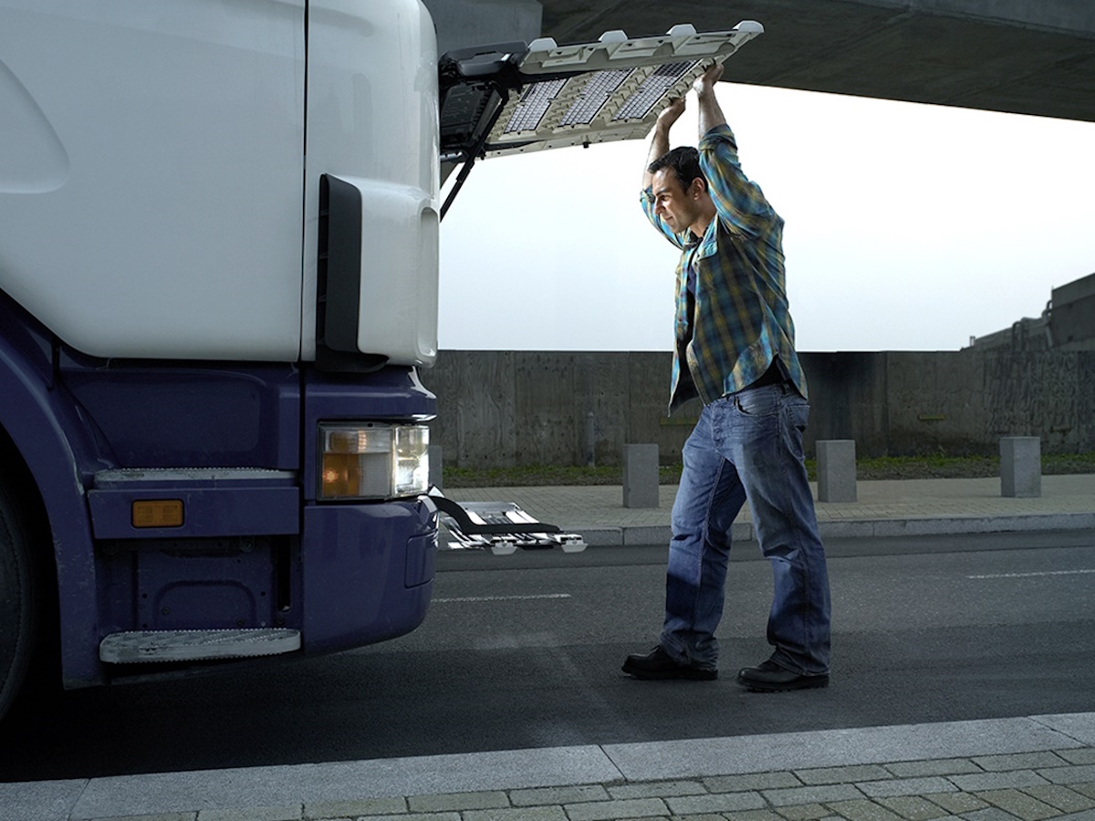 Man inspecting bus