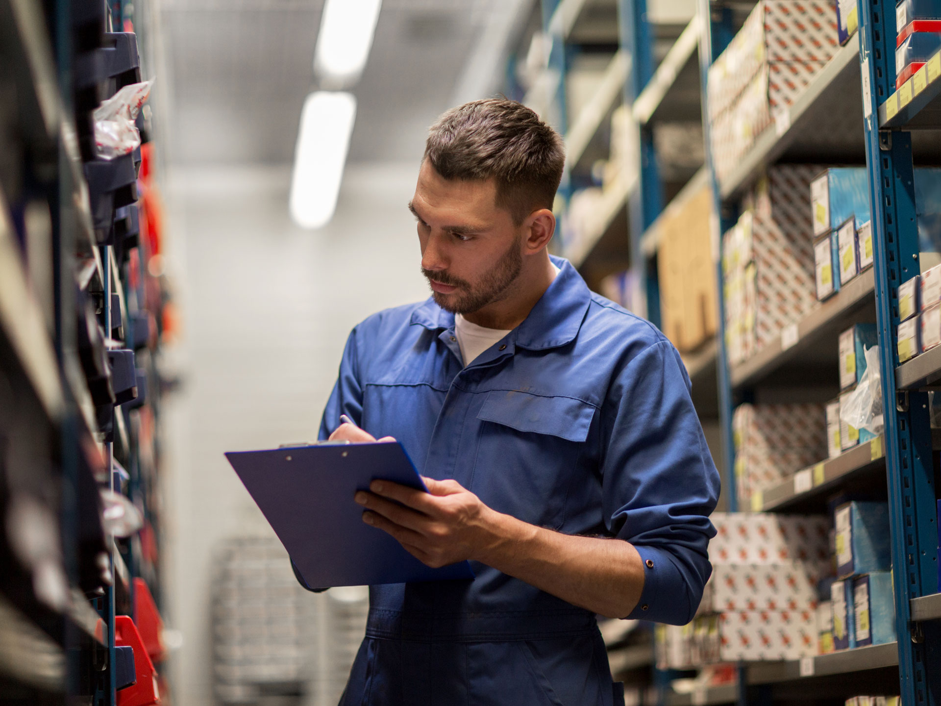 Man looking at battery storage checklist