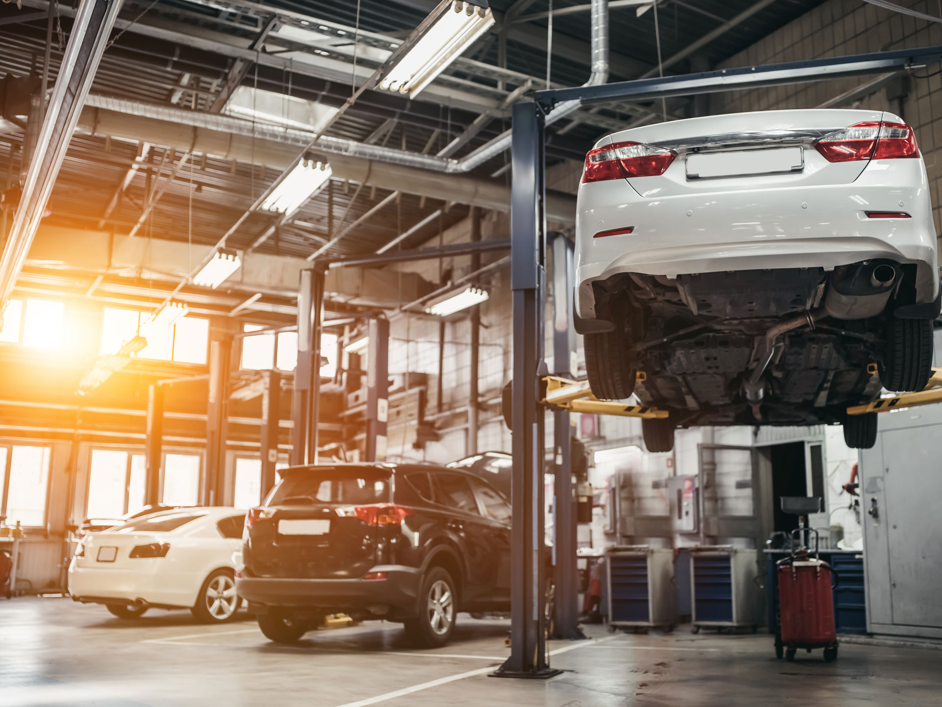 Cars in workshop garage