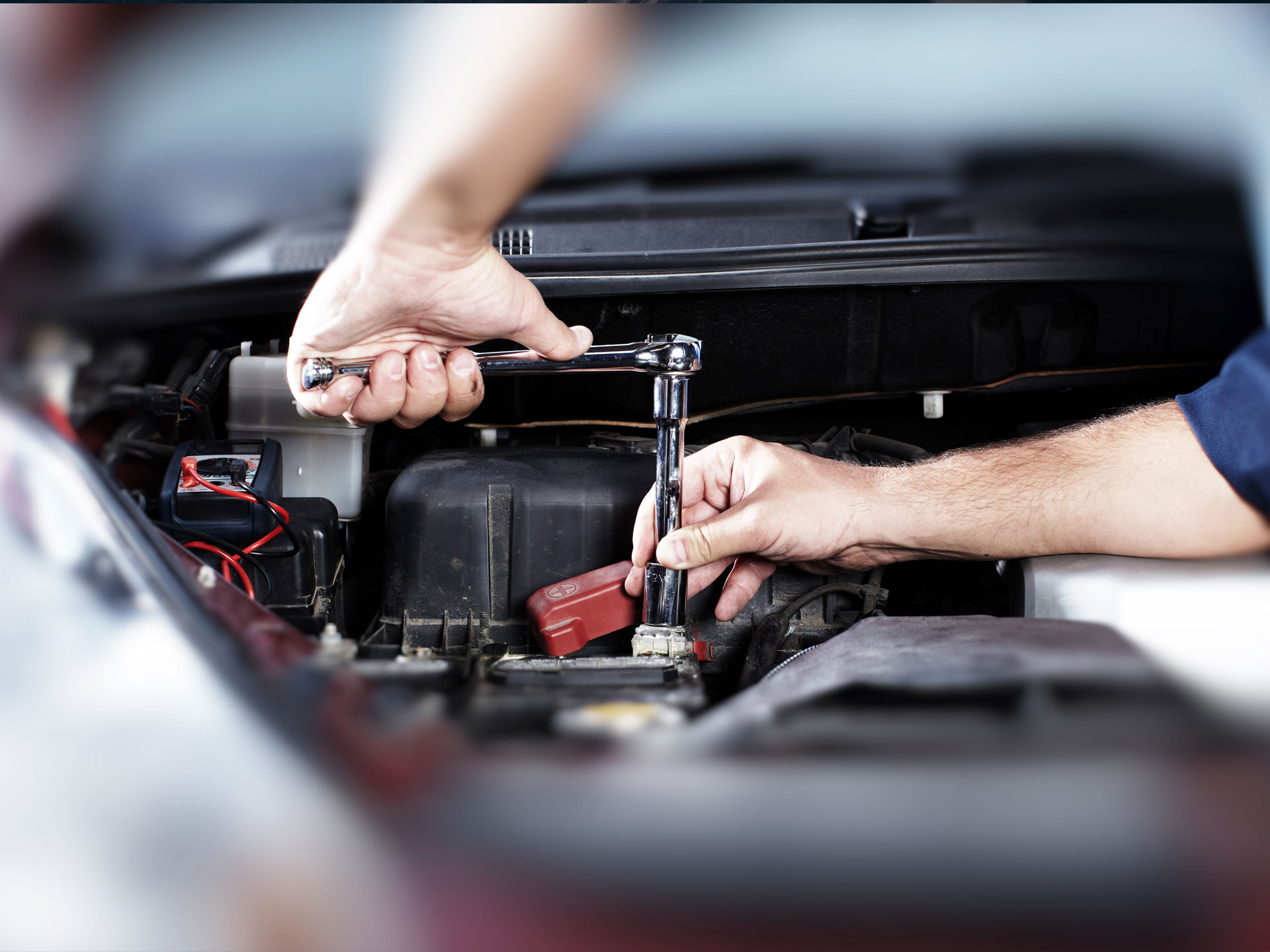 Hands using a torque wrench