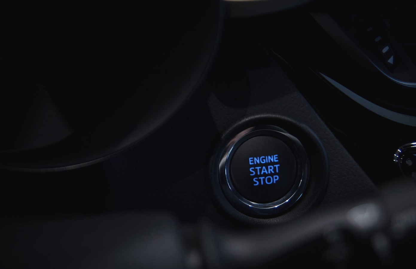 Engine start stop button