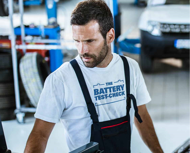 Man with battery test-check shirt